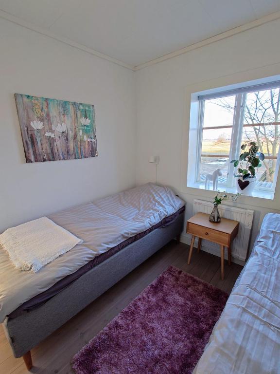 Postel nebo postele na pokoji v ubytování Ales BnB