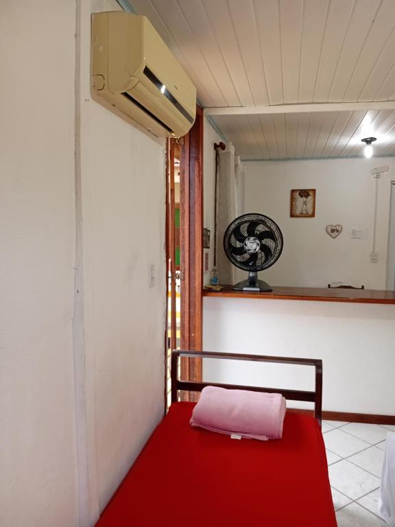 Postel nebo postele na pokoji v ubytování Hospedagem dona Alaide