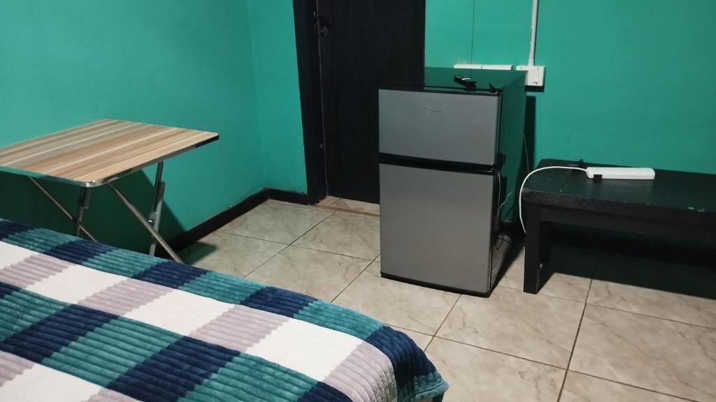 Postel nebo postele na pokoji v ubytování Cápsula 127