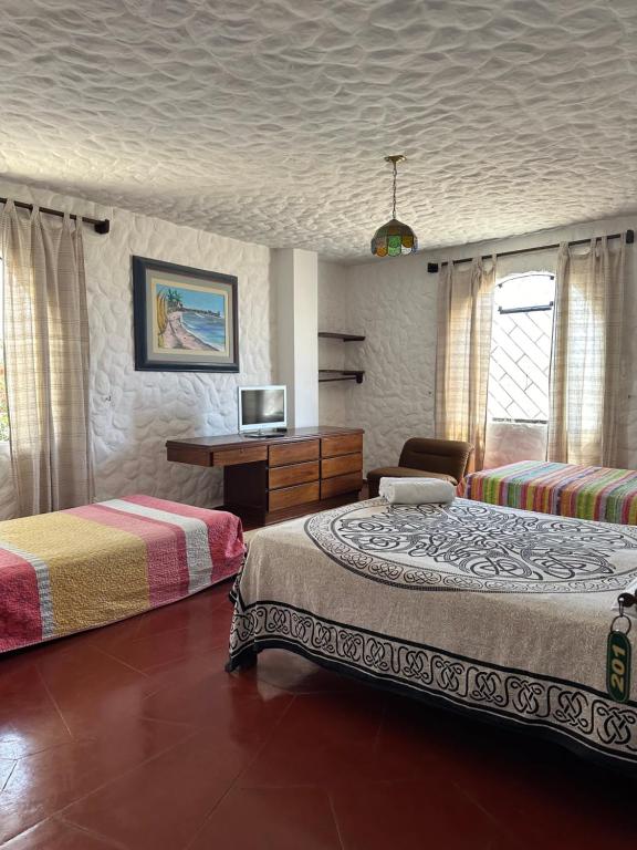 Ancla Hostal - Habitación Triple
