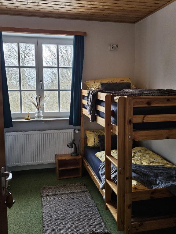 Postel nebo postele na pokoji v ubytování Marktredwitzer Haus