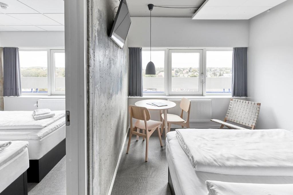 Una cama o camas en una habitación de Four Points Flex by Sheraton Aarhus Viby