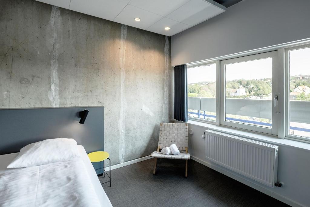 Una cama o camas en una habitación de Four Points Flex by Sheraton Aarhus Viby