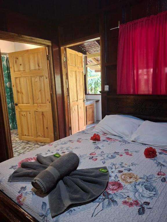 Postel nebo postele na pokoji v ubytování Cabinas Nirvana