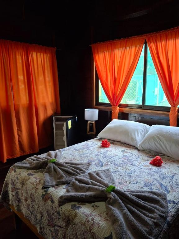 Postel nebo postele na pokoji v ubytování Cabinas Nirvana