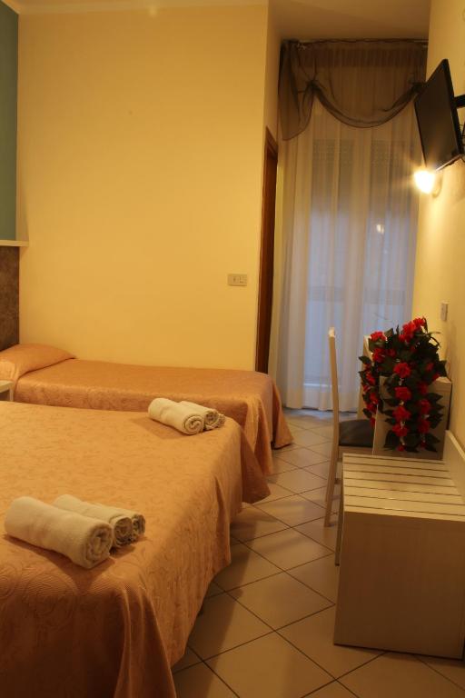 Postel nebo postele na pokoji v ubytování Hotel Senyor