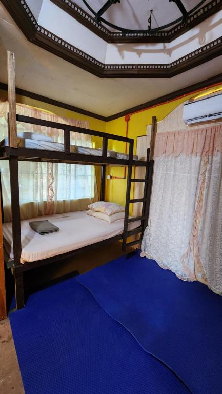Postel nebo postele na pokoji v ubytování Screaming Gecko Hostel