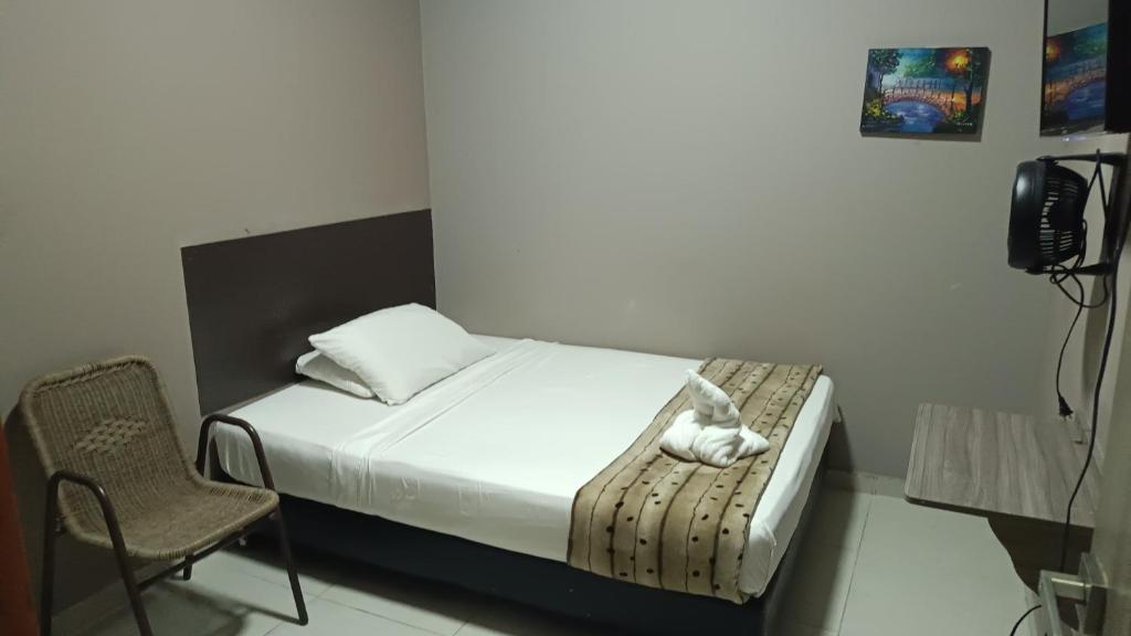 TV a/nebo společenská místnost v ubytování Hotel Simón Plaza