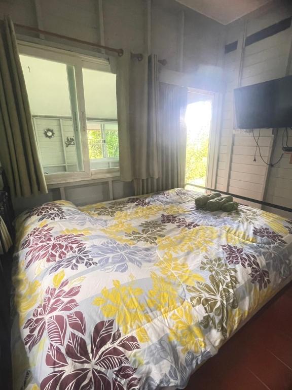 Postel nebo postele na pokoji v ubytování One khaokho homestay