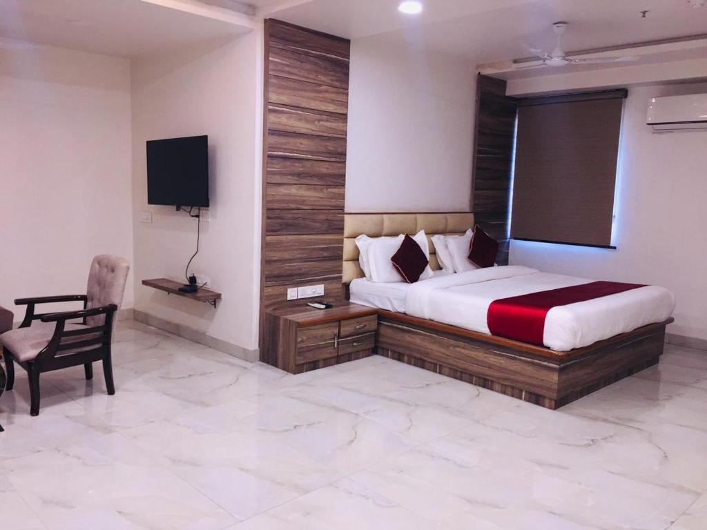 Postel nebo postele na pokoji v ubytování Hotel Gharana Tree