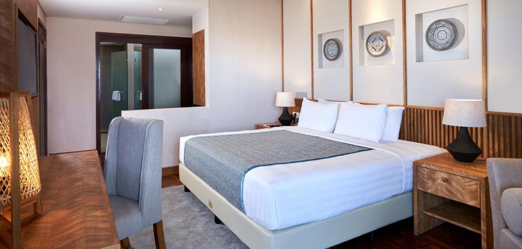 Postel nebo postele na pokoji v ubytování Grand Mirage Resort & Thalasso Bali
