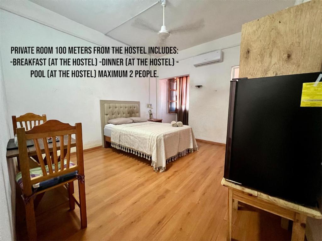 Letto o letti in una camera di Huitzilin Hostal