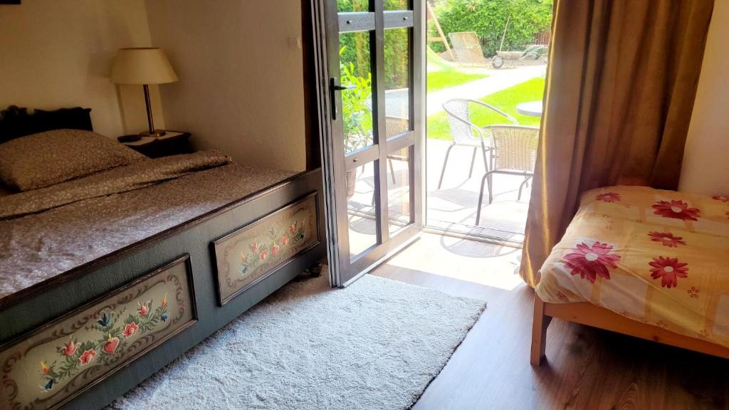 Postel nebo postele na pokoji v ubytování Apartmány Anička vo Važci