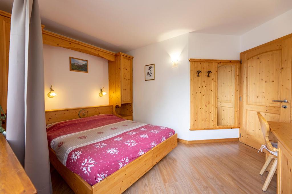 Postel nebo postele na pokoji v ubytování B.& B. Corradini
