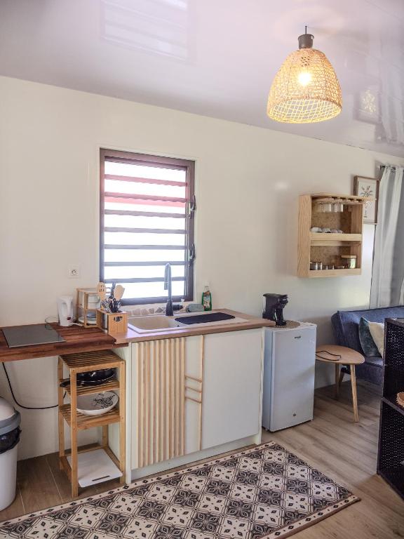 Kuchyň nebo kuchyňský kout v ubytování Maharepa rh LODGE