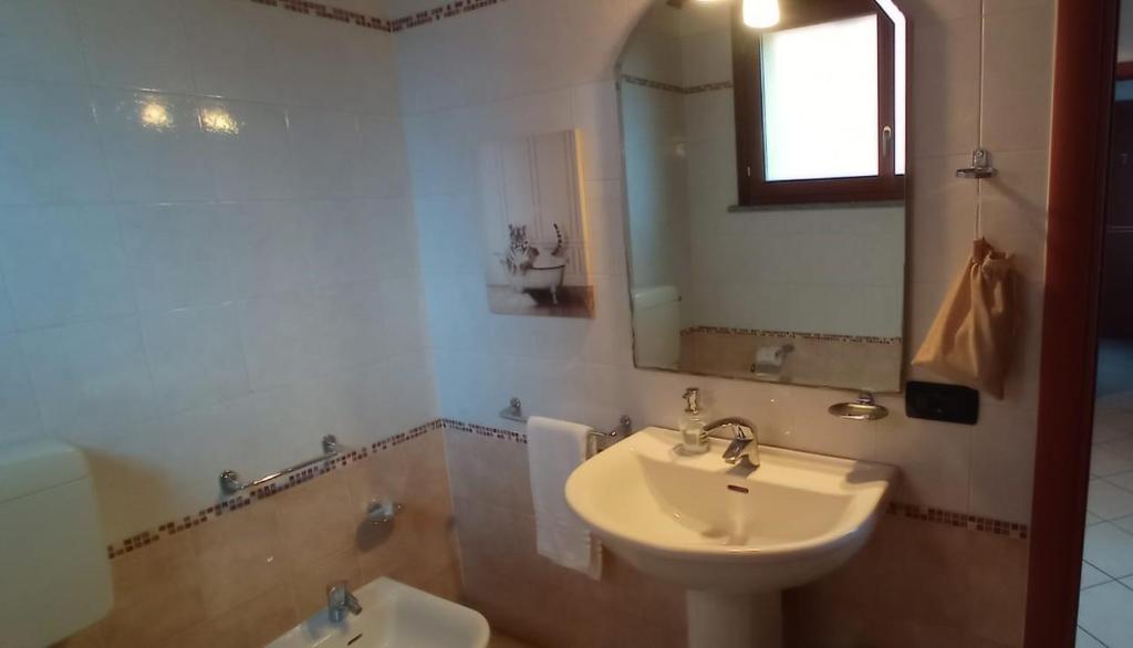Koupelna v ubytování Hotel IL Rifugio