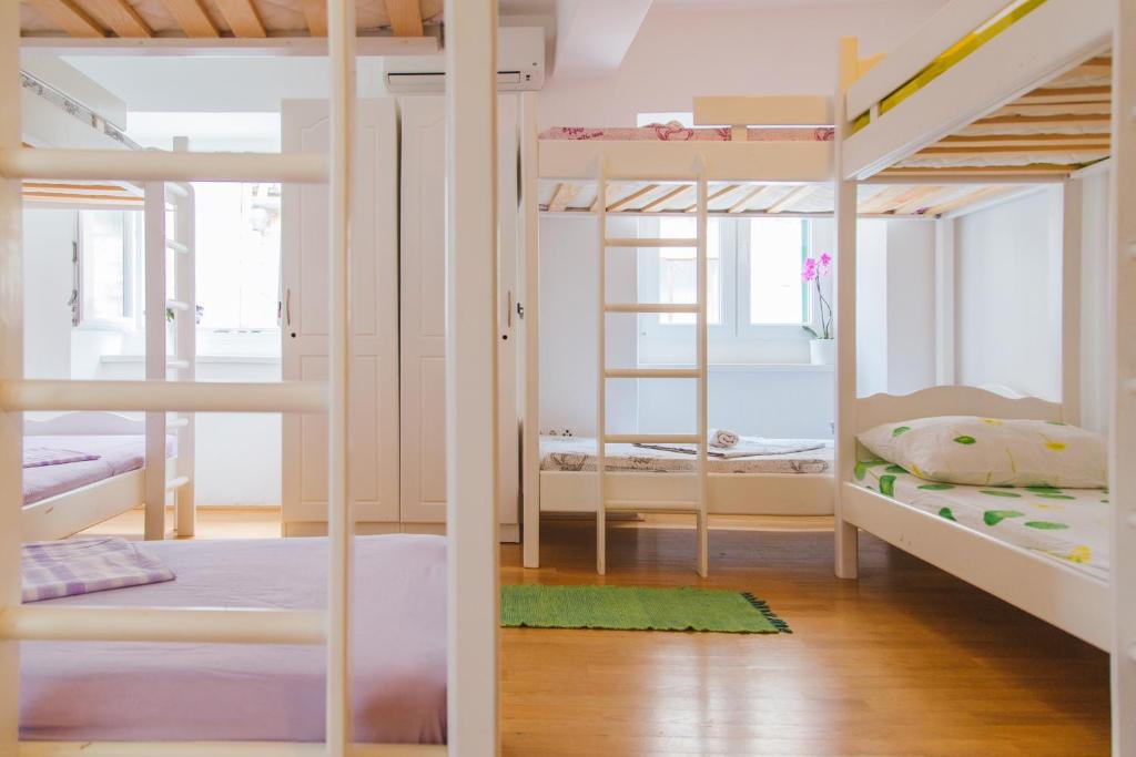 Postel nebo postele na pokoji v ubytování Cheap Sleep Marinero