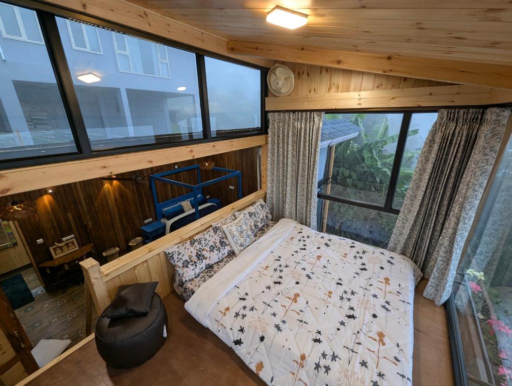 Postel nebo postele na pokoji v ubytování Cloudwalks Homestay