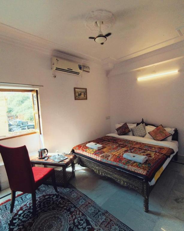 Postel nebo postele na pokoji v ubytování Foreign Guest house