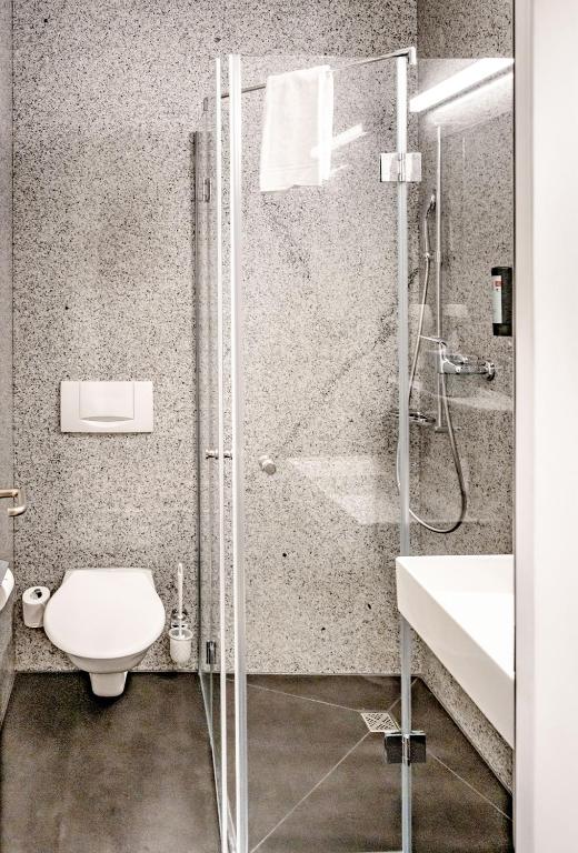 Koupelna v ubytování Tailormade Hotel STANS SÜD