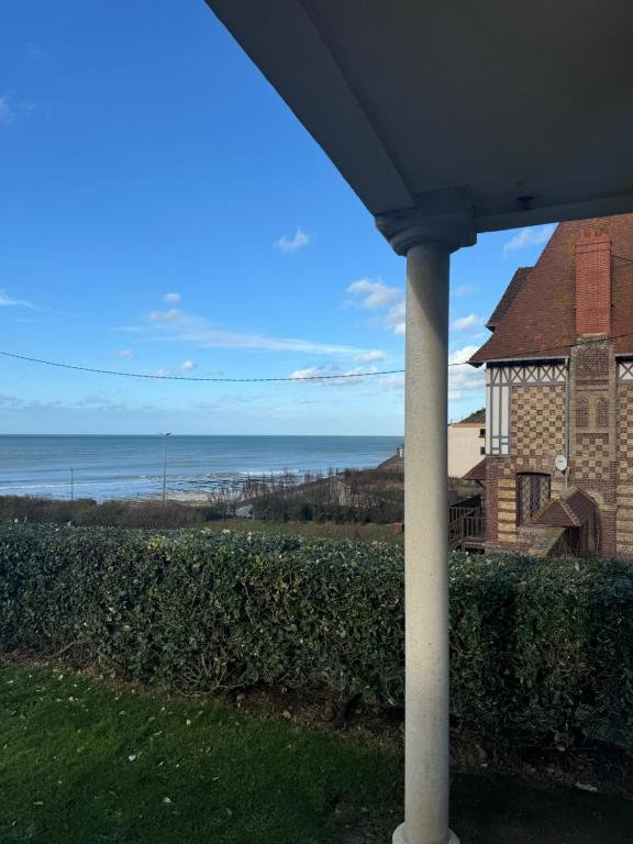 a view of the ocean from a house at Les Villas de Puys - Dieppe in Dieppe