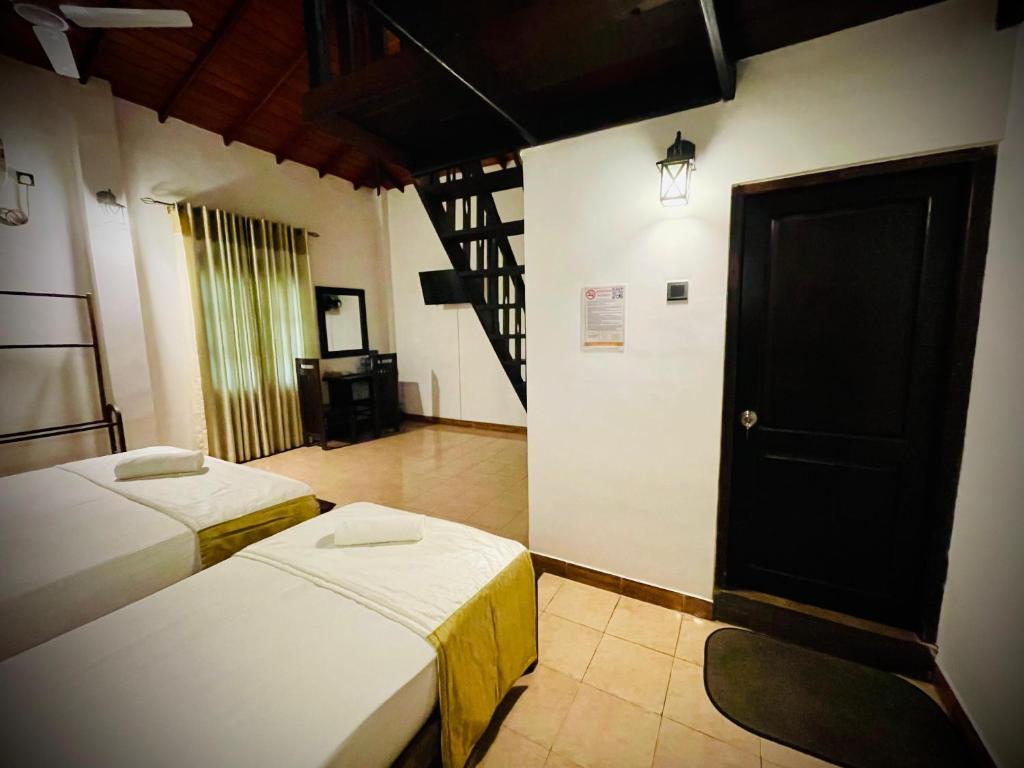 Postel nebo postele na pokoji v ubytování Hotel Grand Casa