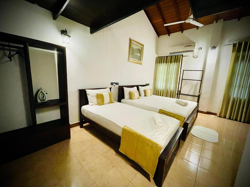 Postel nebo postele na pokoji v ubytování Hotel Grand Casa