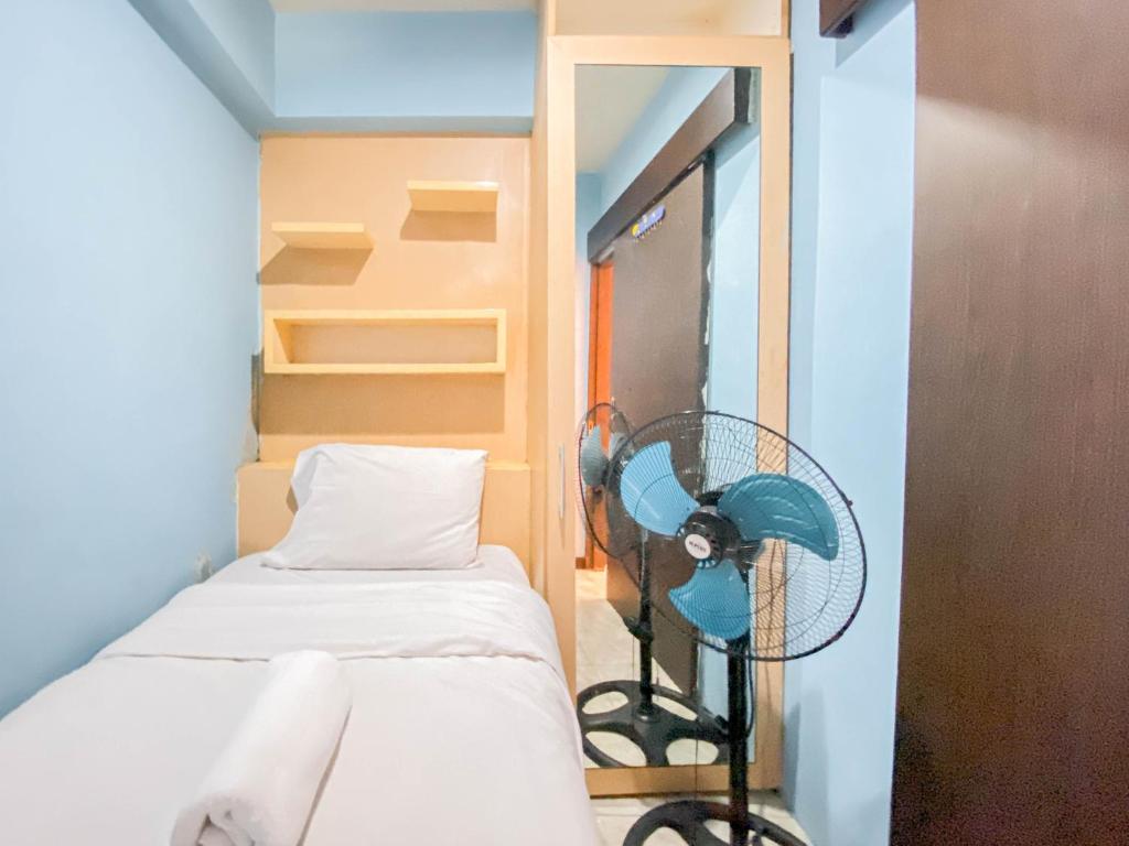 Homey Living 2BR at Jarrdin Cihampelas Apartment By Travelio - Two-Bedroom Apartment