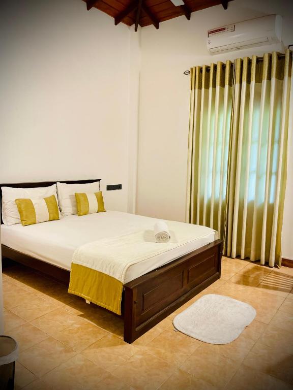 Postel nebo postele na pokoji v ubytování Hotel Grand Casa