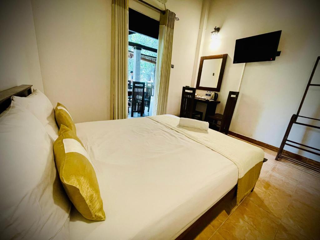 Postel nebo postele na pokoji v ubytování Hotel Grand Casa