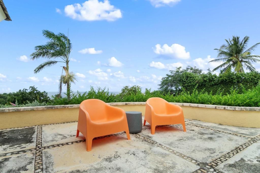 Posezení v ubytování Hospitality Expert Greens 2BR Pool Beach