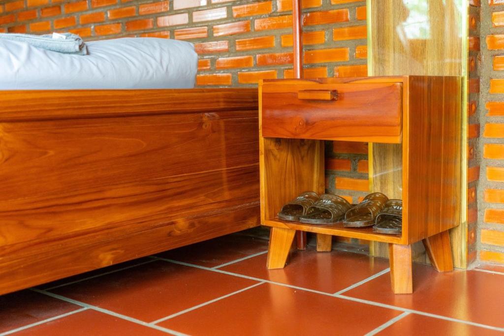 Postel nebo postele na pokoji v ubytování Homestay Dream hill
