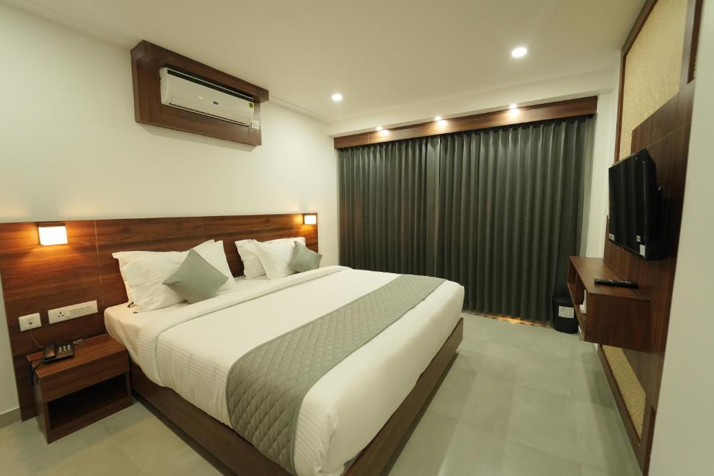 Postel nebo postele na pokoji v ubytování Georjoys Hotels & Resorts