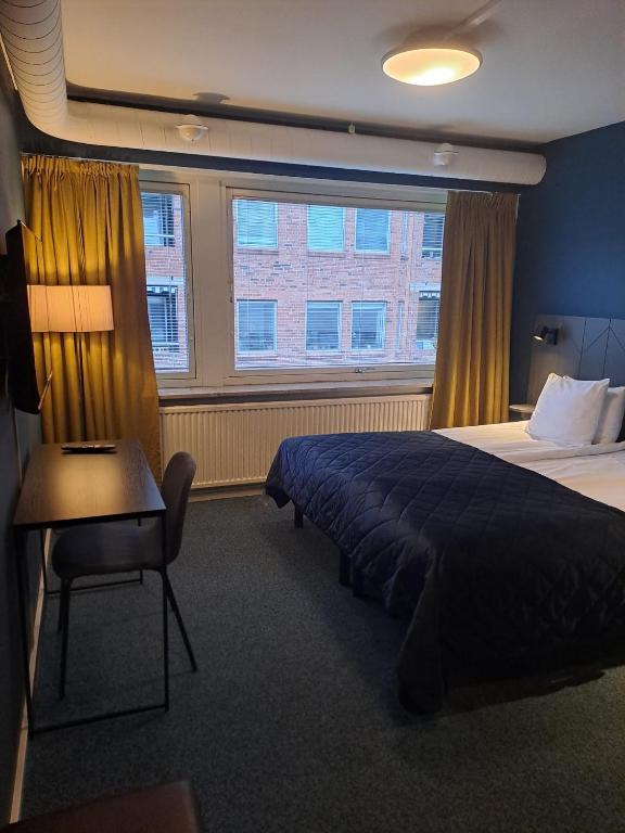 Postel nebo postele na pokoji v ubytování HOTEL N Hostel Malmö City
