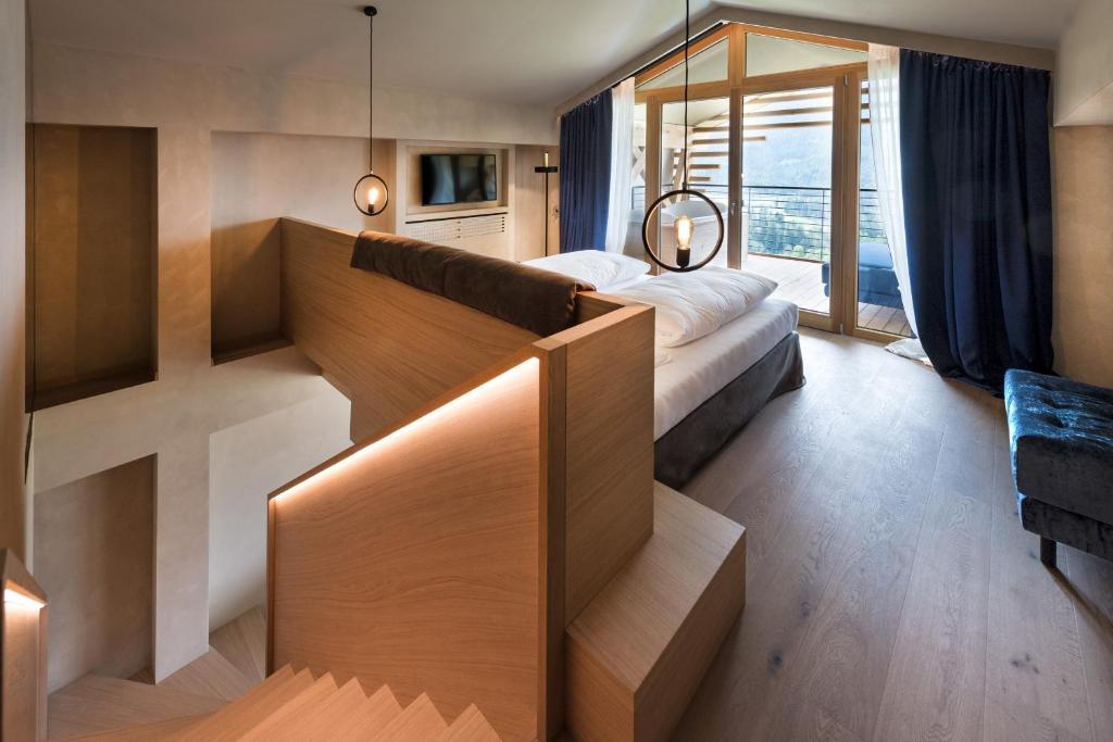 Postel nebo postele na pokoji v ubytování Hotel Valentinerhof