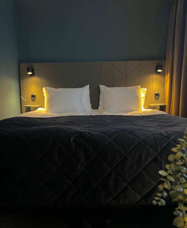 Postel nebo postele na pokoji v ubytování HOTEL N Hostel Malmö City