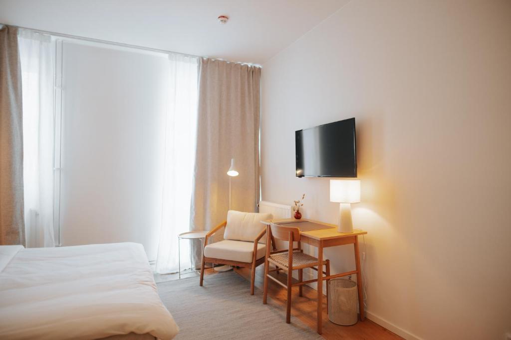 TV a/nebo společenská místnost v ubytování The Lab Hotel