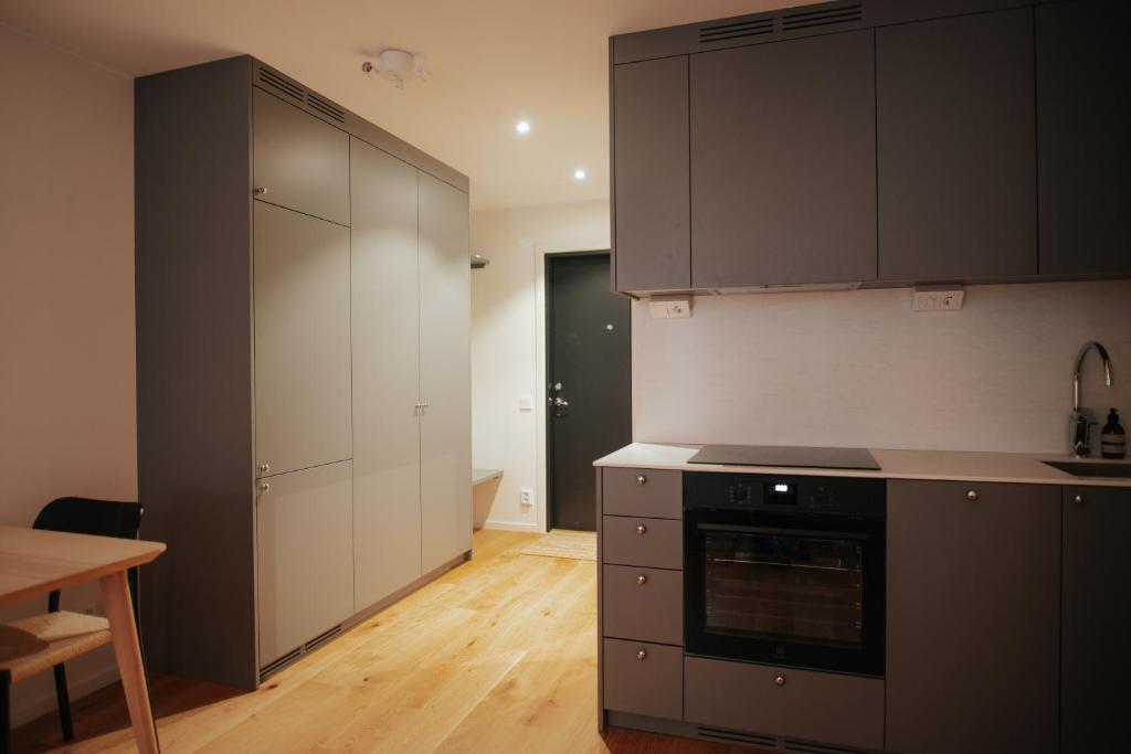 Kuchyň nebo kuchyňský kout v ubytování The Lab Hotel