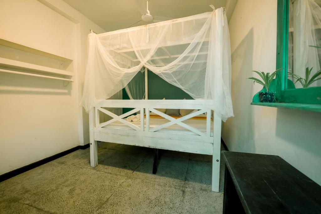 Postel nebo postele na pokoji v ubytování Ceylonza