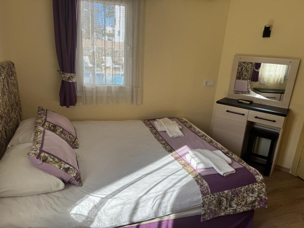 Postel nebo postele na pokoji v ubytování Canna Garden Hotel - Adult Only
