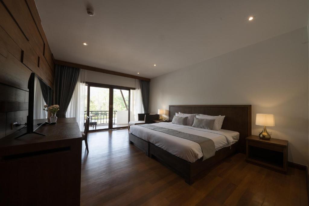 Postel nebo postele na pokoji v ubytování Belle Villa Resort, Khao Yai