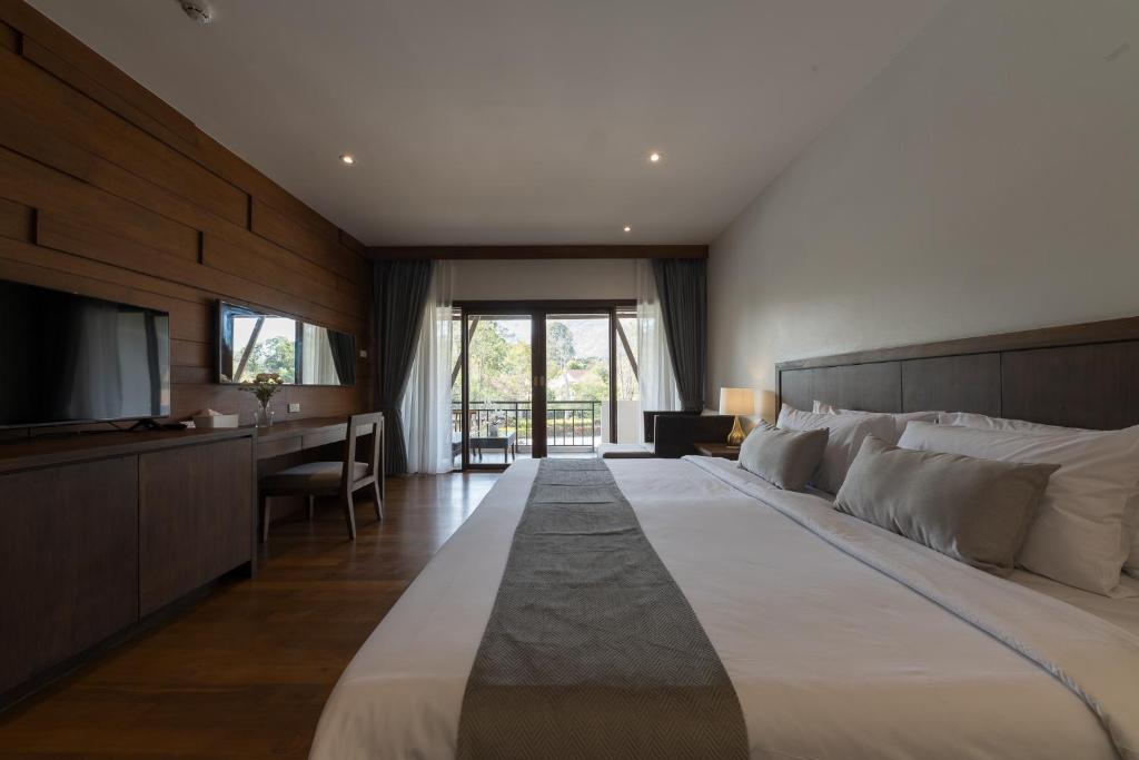 Postel nebo postele na pokoji v ubytování Belle Villa Resort, Khao Yai