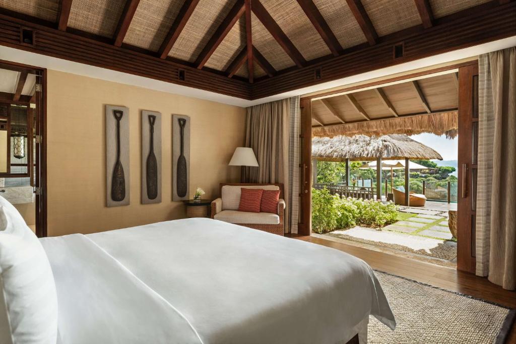 Postel nebo postele na pokoji v ubytování Shangri-La Boracay
