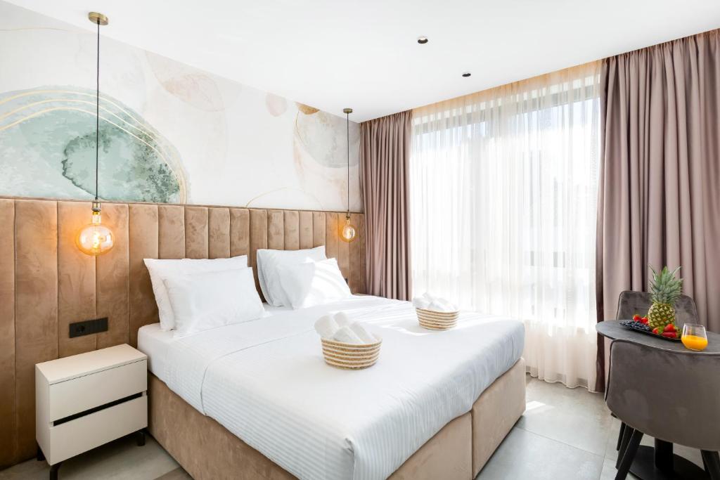 Ένα ή περισσότερα κρεβάτια σε δωμάτιο στο Fly Room - S8 - MPolo