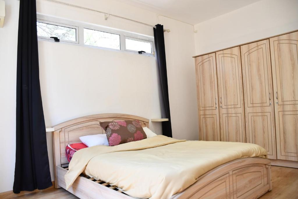 Postel nebo postele na pokoji v ubytování Martello Apartments