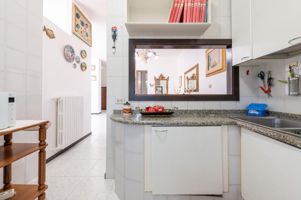 Kuchyňa alebo kuchynka v ubytovaní Residenza Gabry