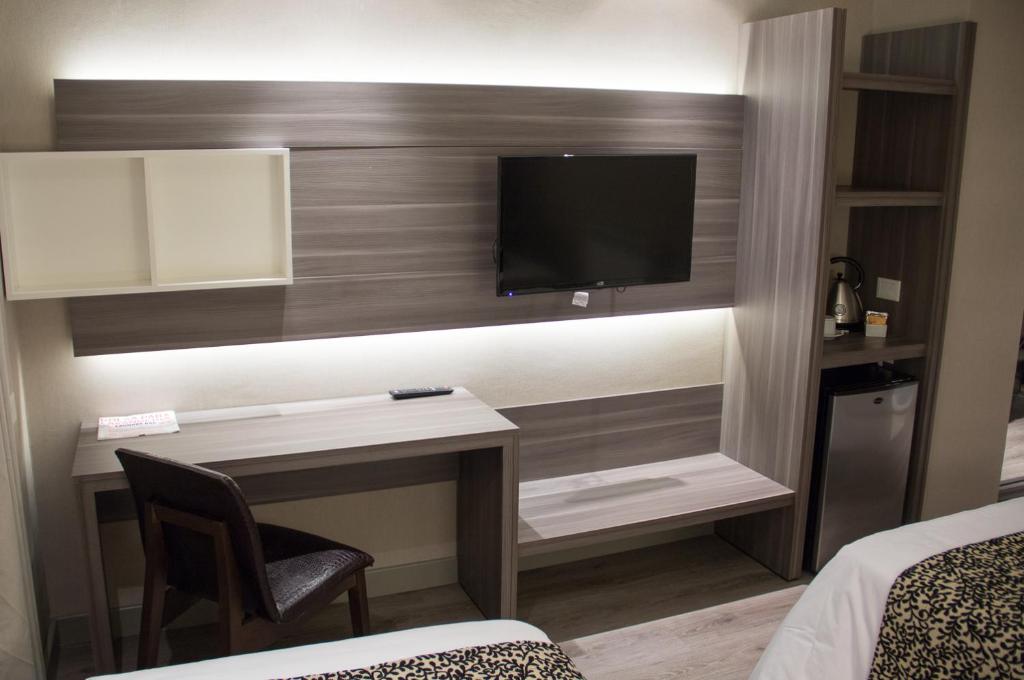 TV a/nebo společenská místnost v ubytování Amerian Río Gallegos Apart & Suites
