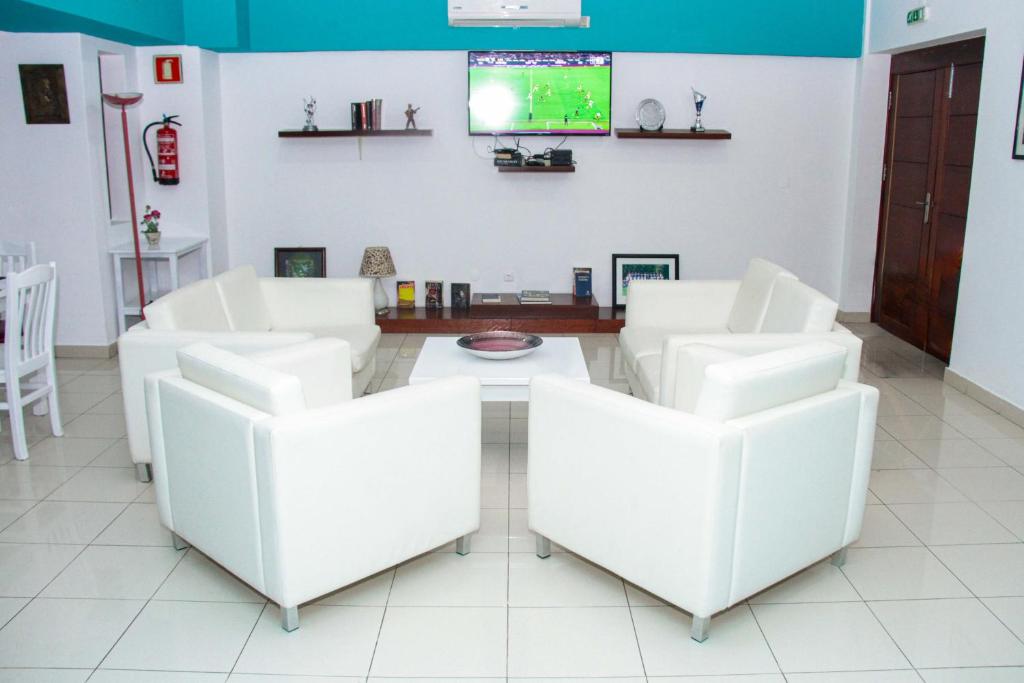 TV a/nebo společenská místnost v ubytování Hotel LIVVO Don Paco