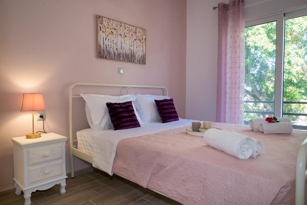 Voodi või voodid majutusasutuse Filerimos City Center Apt in Ialysos Rhodes toas