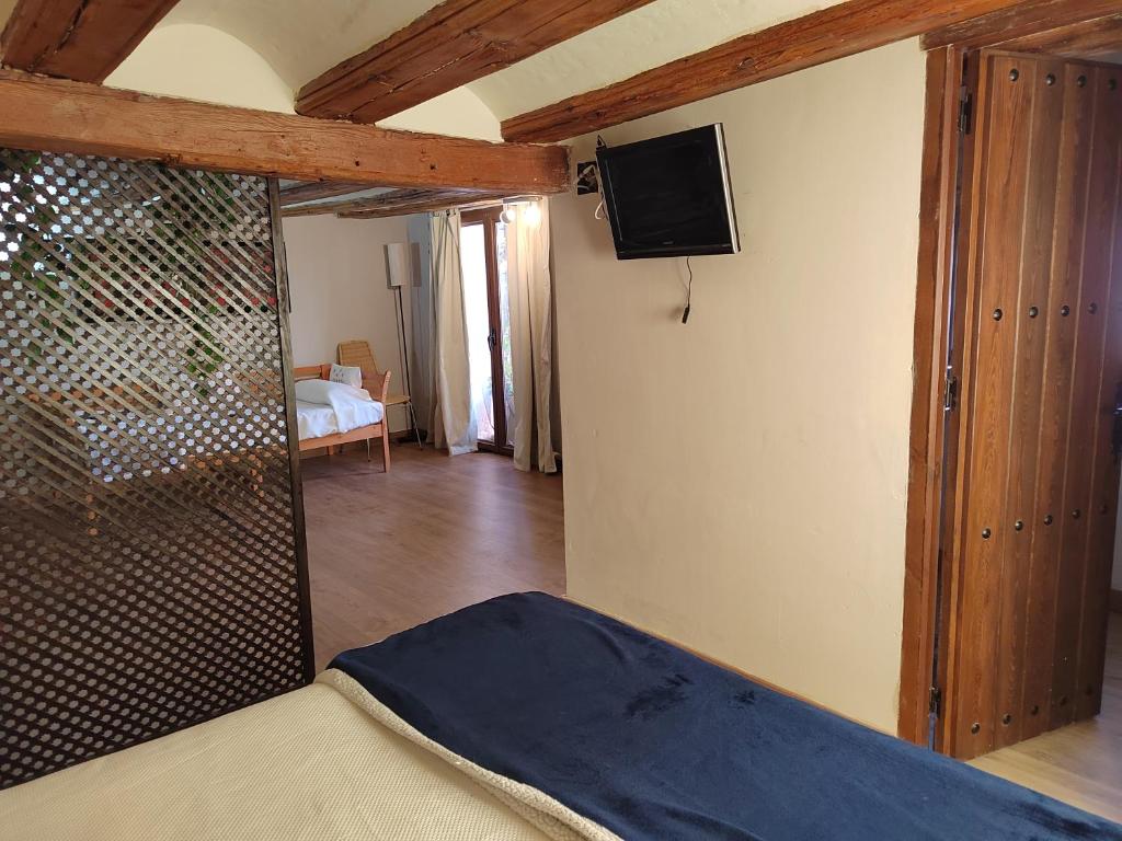 TV a/nebo společenská místnost v ubytování Xana Casa Rural